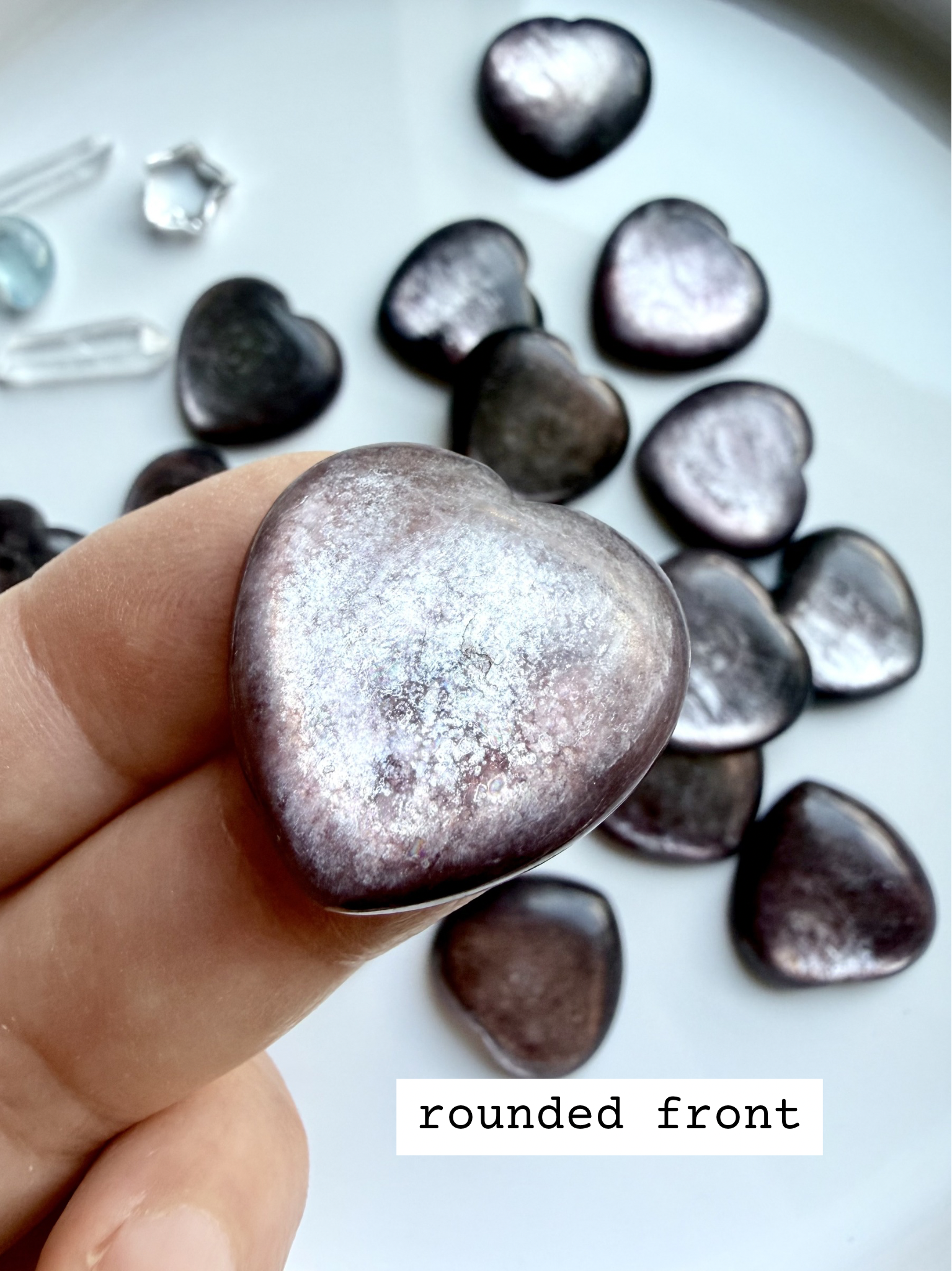 Gem lepidolite heart rounded front view showing polished surface and soft purple shimmer