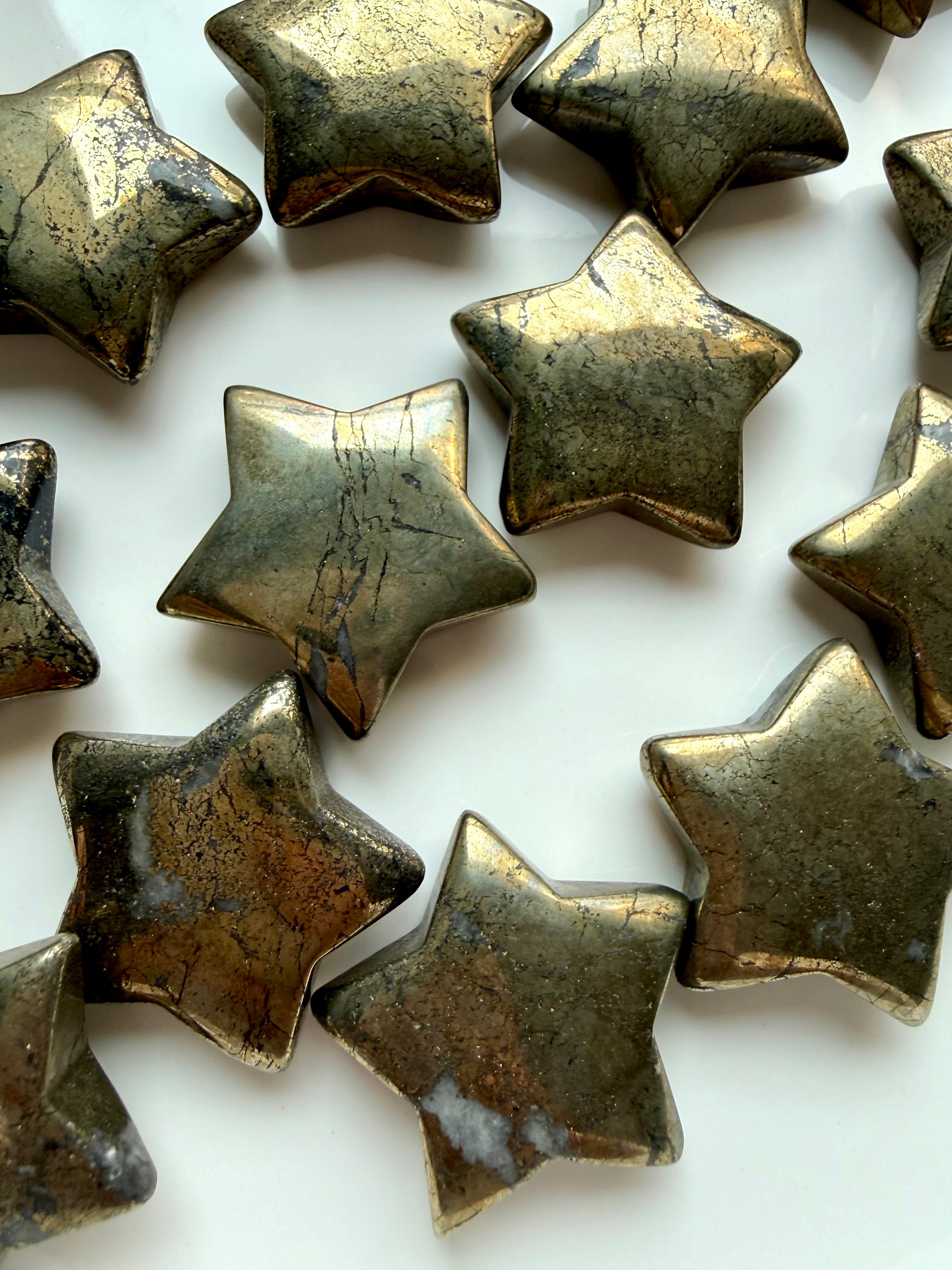 Polished Pyrite star crystals with warm gold tones for prosperity, abundance and manifestation