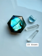 faceted labradorite hexagon with bright aqua flash styled with quartz points crystal star of david for intuition and psychic awareness