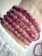 Pink Tourmaline bracelet stack showing luminous pink gemstone beads with natural transparency and romantic berry tones