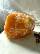 Large Orange Calcite mineral display piece from Mexico with dramatic formations and warm orange color