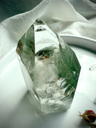 One-of-a-kind Chlorite Phantom Garden Quartz tower with scenic green inclusions and exceptional clarity
