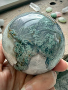 Moss Agate sphere with Quartz veins, druzy crystal details, and natural green landscape patterns