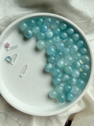Blue Aquamarine mini spheres with clear quartz points – soothing March birthstone crystal display
