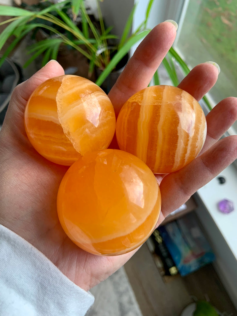 Sparkly Orange Calcite Spheres on Stand