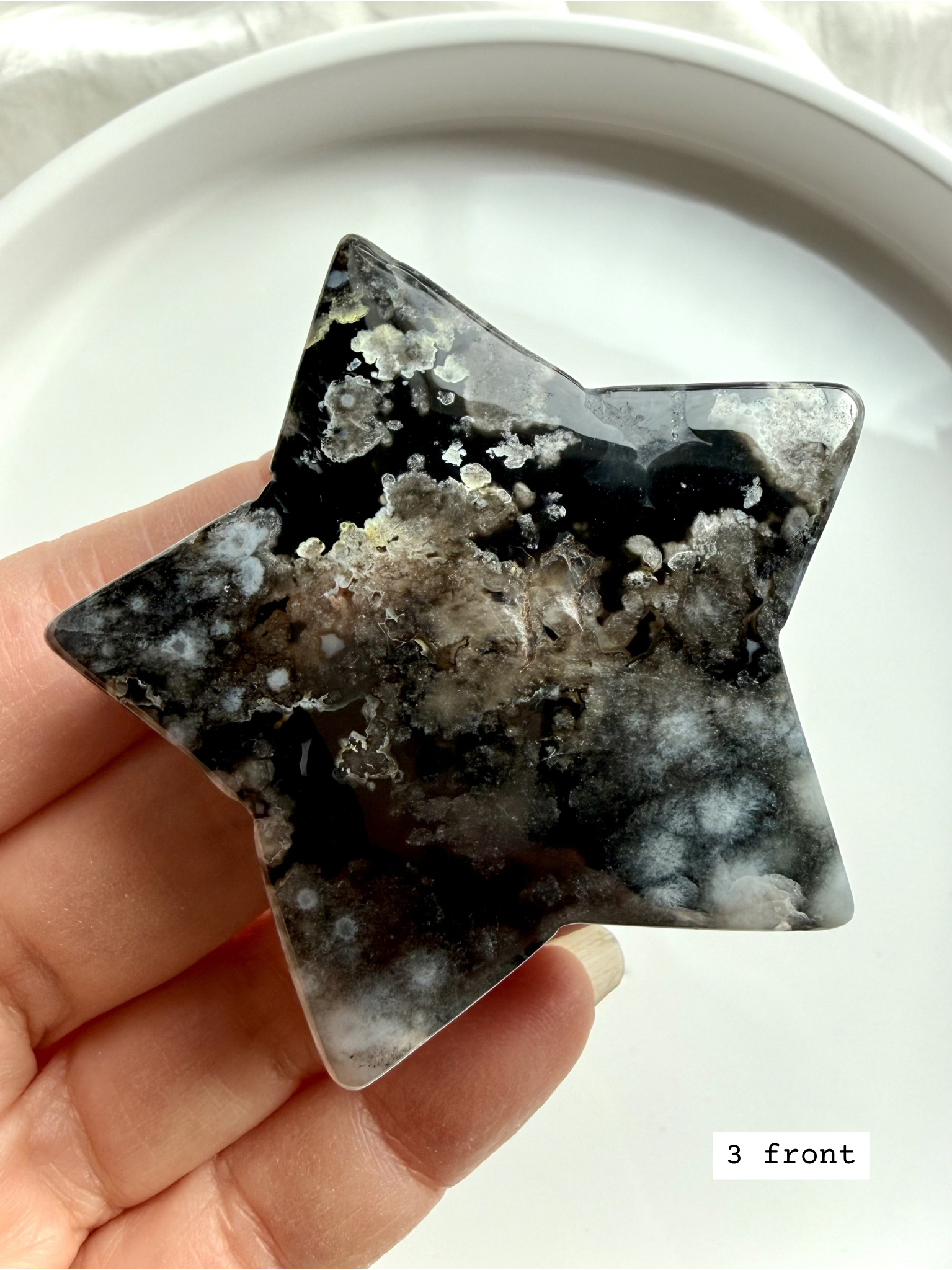 black flower agate star carving #3 front showing high contrast floral formations and druzy details