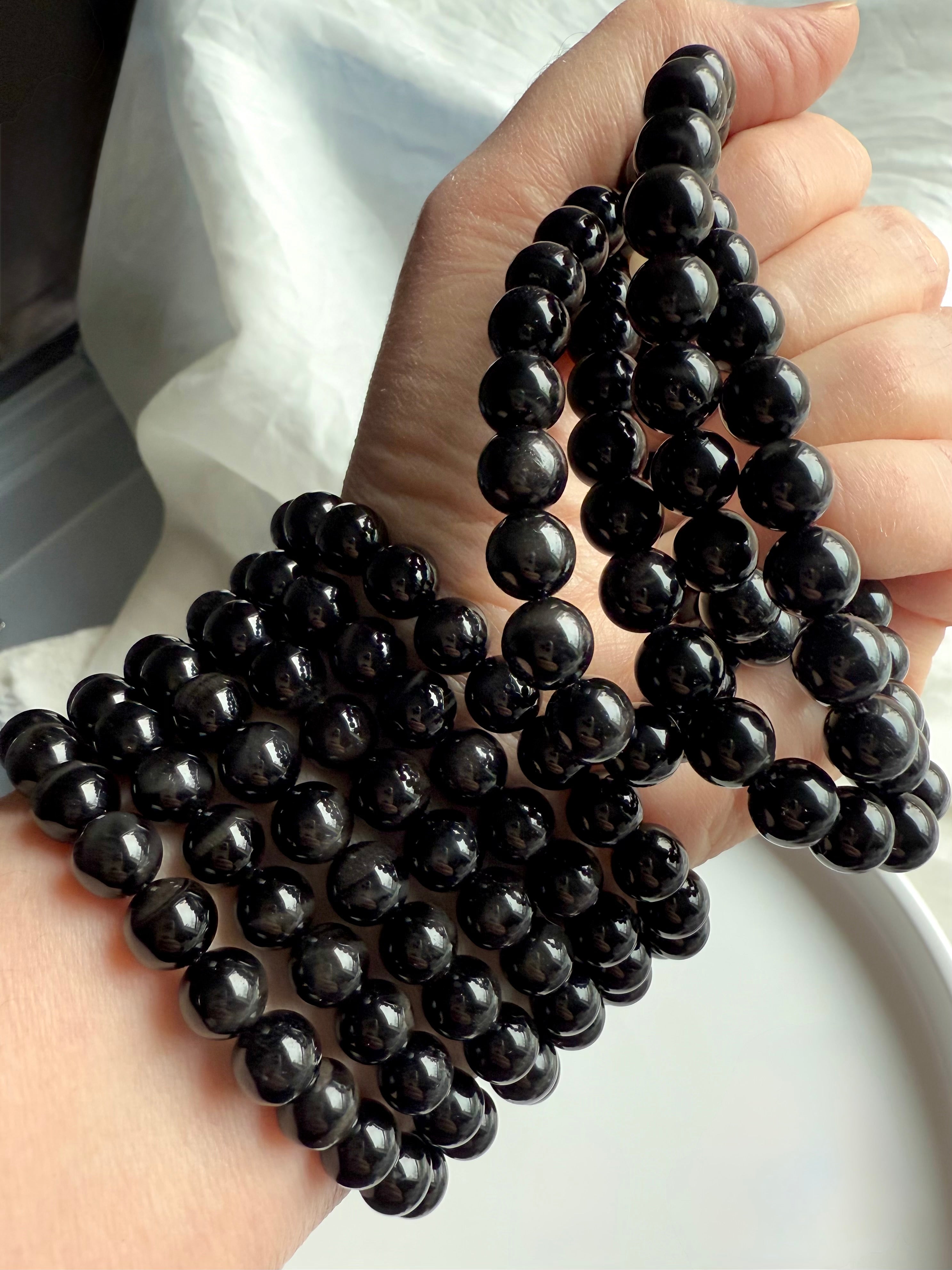 Wear your natural Black Tigers Eye Bracelet to ground your Root Chakra + offer energetic protection