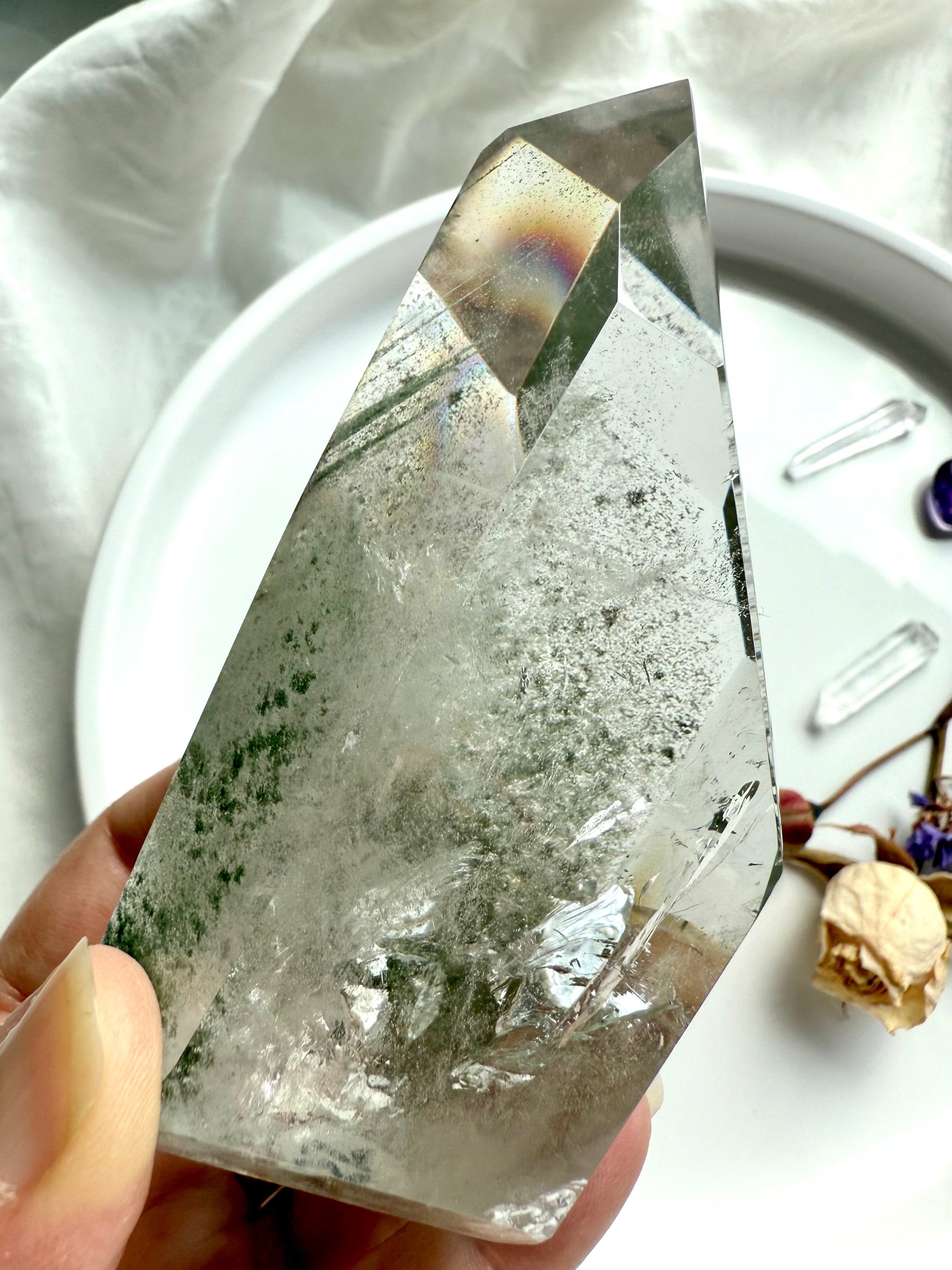 Polished Phantom Quartz tower with intricate green landscapes and exceptional transparency