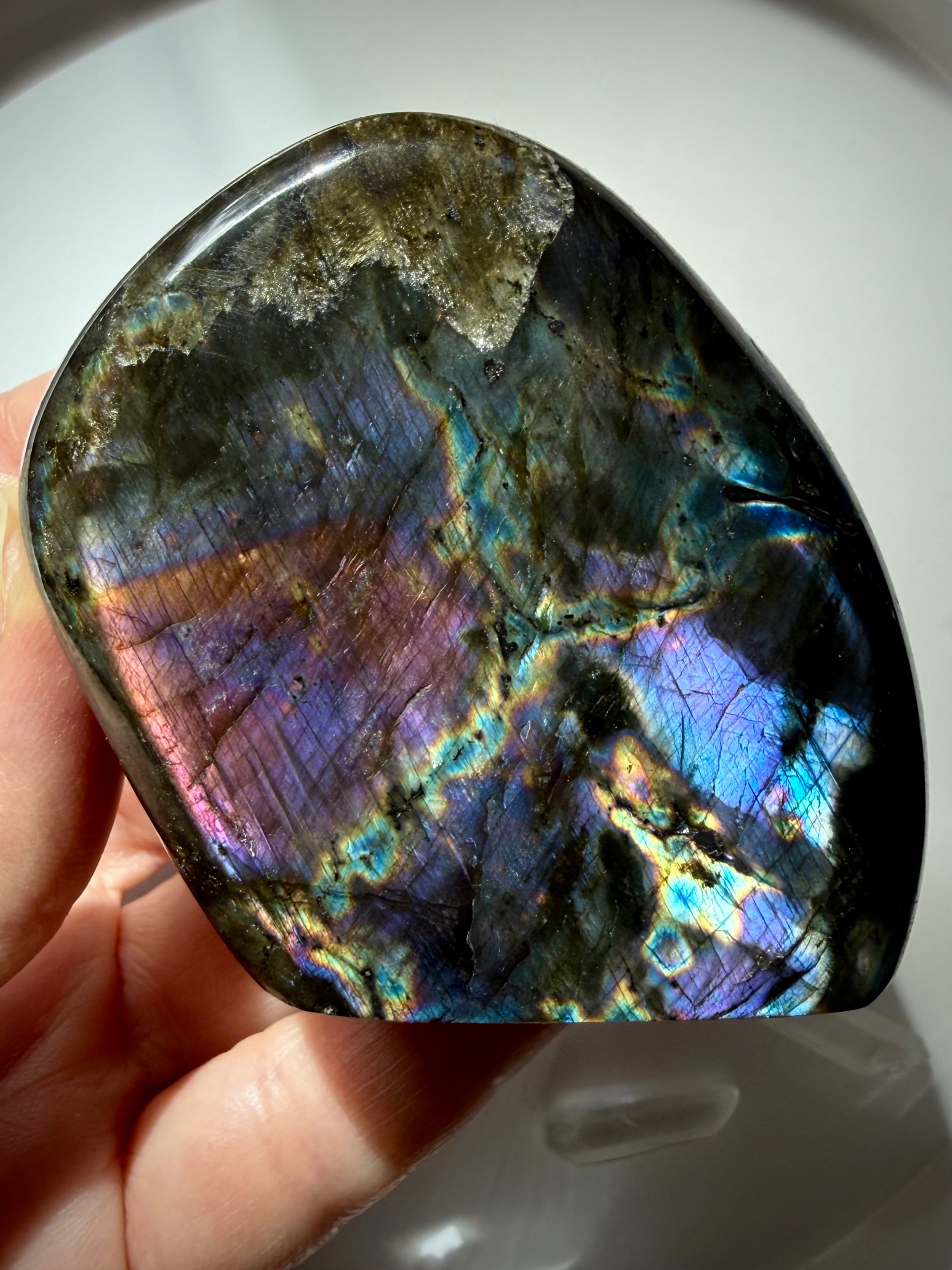 Natural Labradorite crystal freeform displaying vivid blue, green, purple and gold flash