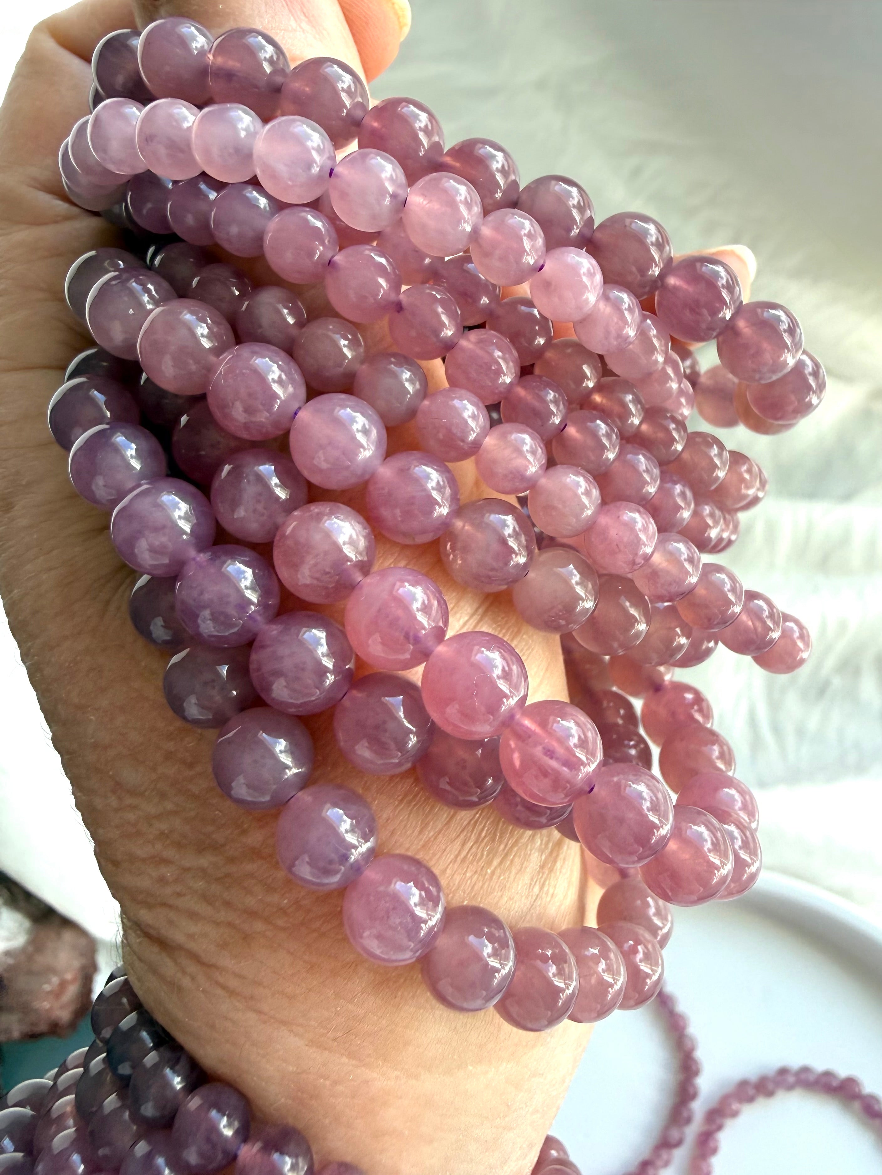 Lavender Rose Quartz crystal bracelet with luminous Madagascar gemstone beads in shifting pink and lavender tones