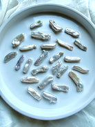 Baroque Stick Pearls with high-luster white nacre, iridescent color and naturally varied shapes