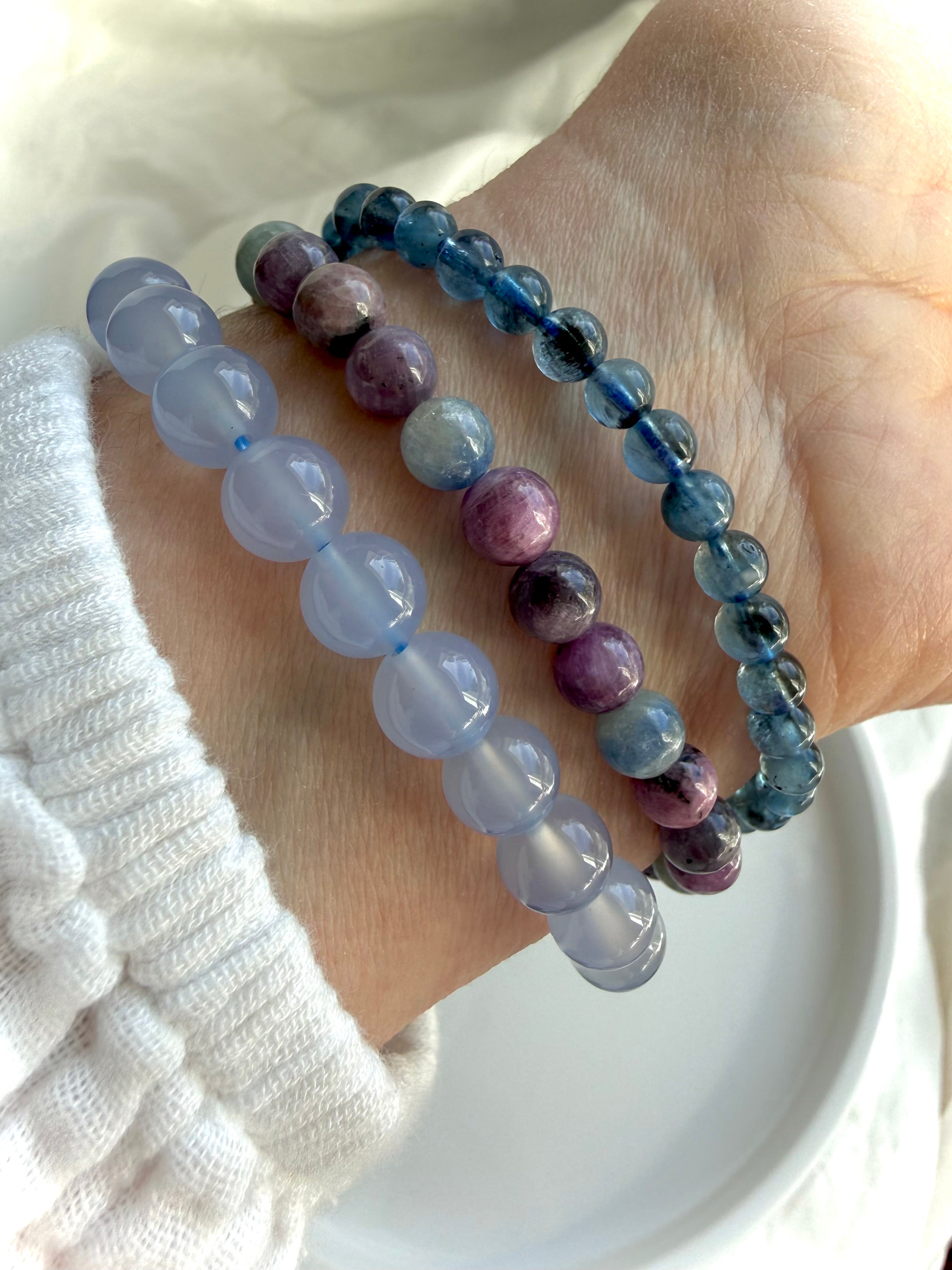 Ruby Sapphire bracelets worn with blue chalcedony & aquamarine crystal bracelets for gemmy stacking ideas