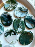 Moss Agate oval worry stones with translucent quartz, moss inclusions and smooth polished surfaces