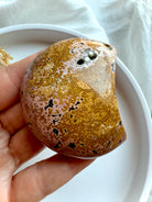 Peach and yellow Ocean Jasper moon stone showing detailed orbicular formations for grounding and emotional balance