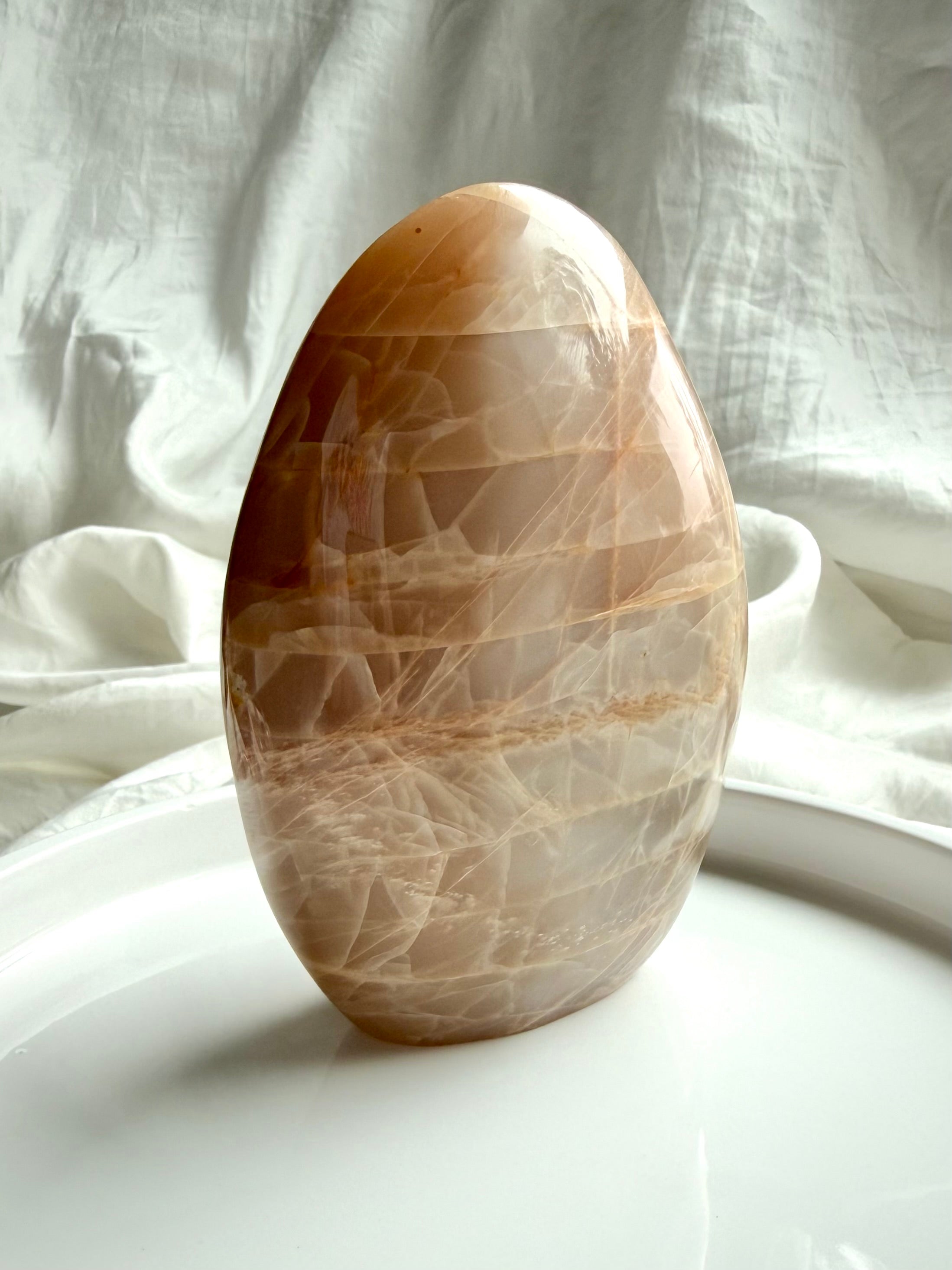 Large Peach Moonstone crystal freeform with luminous shimmer and soft neutral tones from Madagascar