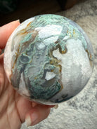 Rare Moss Agate sphere with flowing green patterns, Quartz details, and one of a kind character