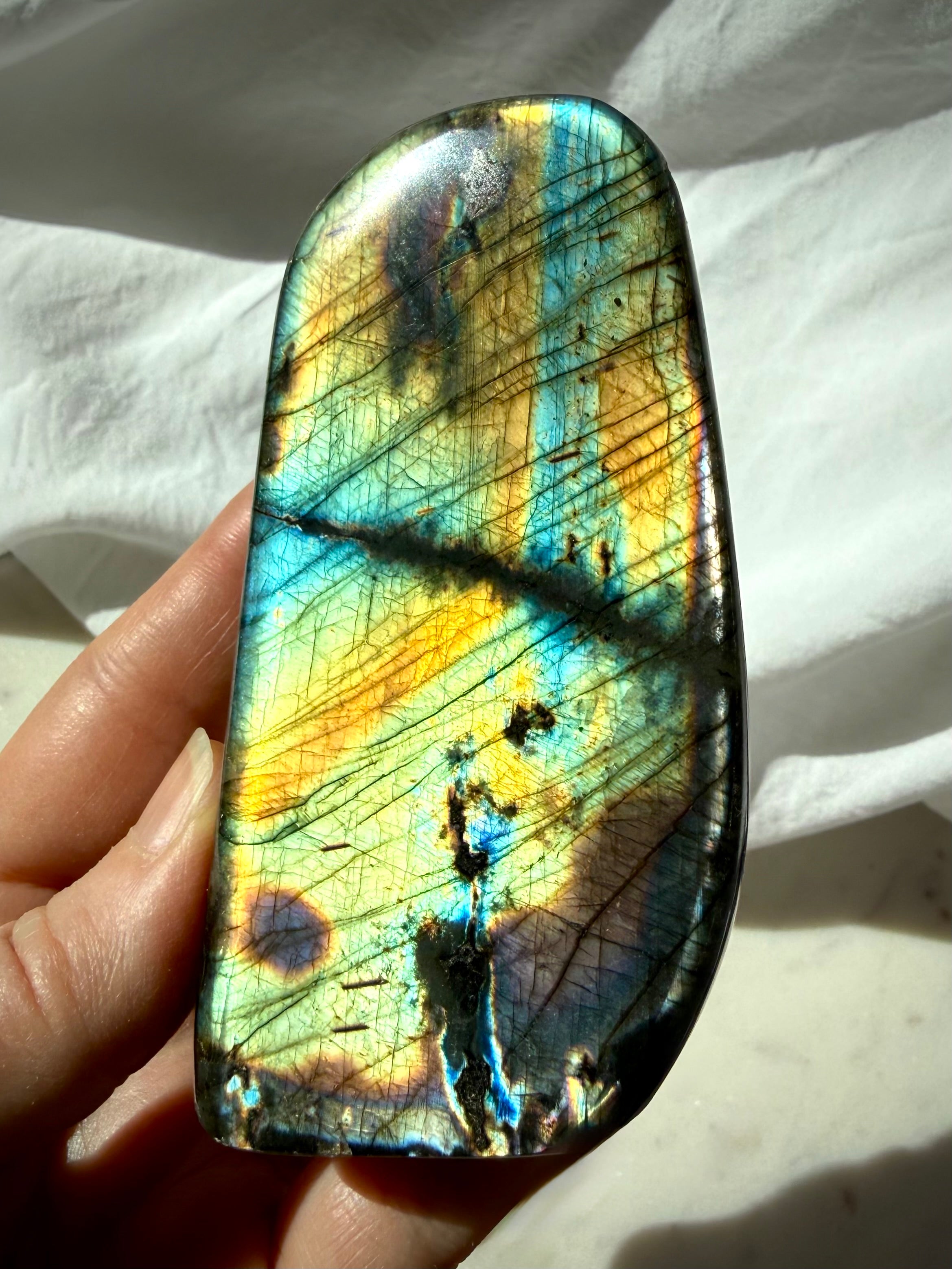 Labradorite freeform with brilliant golden yellow, aqua, and green labradorescence