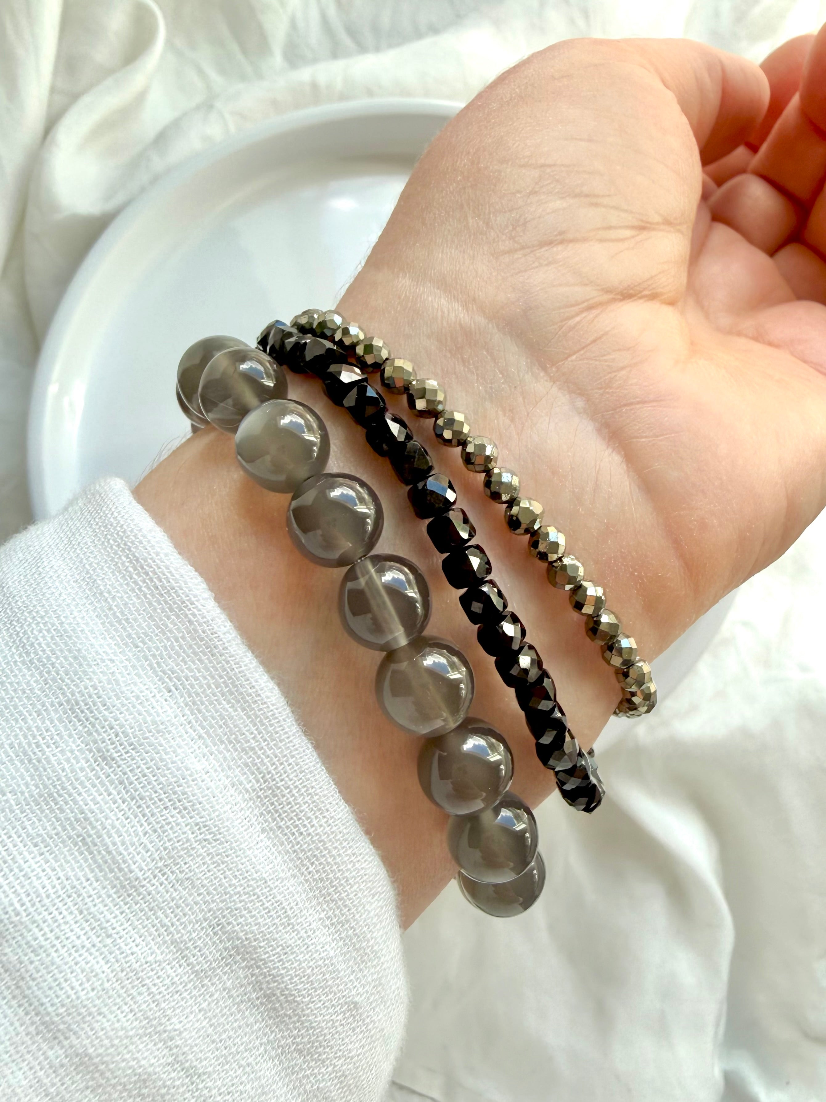 Black Moonstone bracelet layered with Black Spinel and Pyrite crystal bracelets