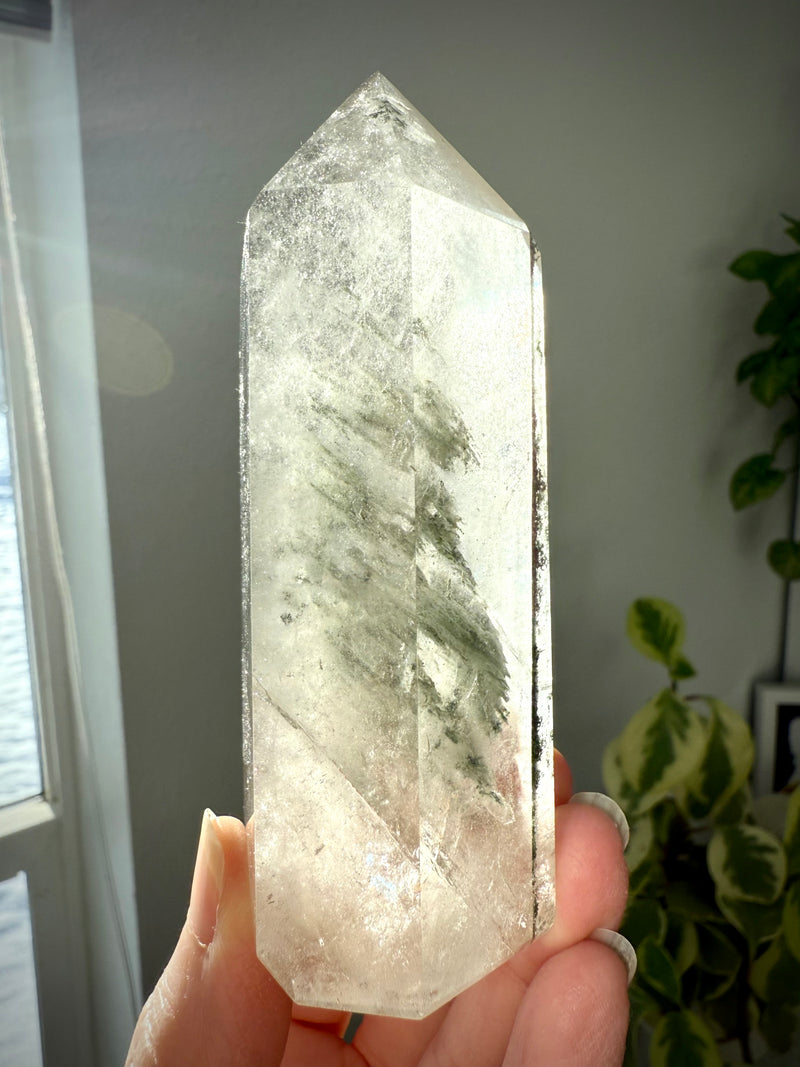 A Garden Quartz Crystal Tower with a stack of Chlorite Phantoms offering Earth wisdom from Mama Gaia