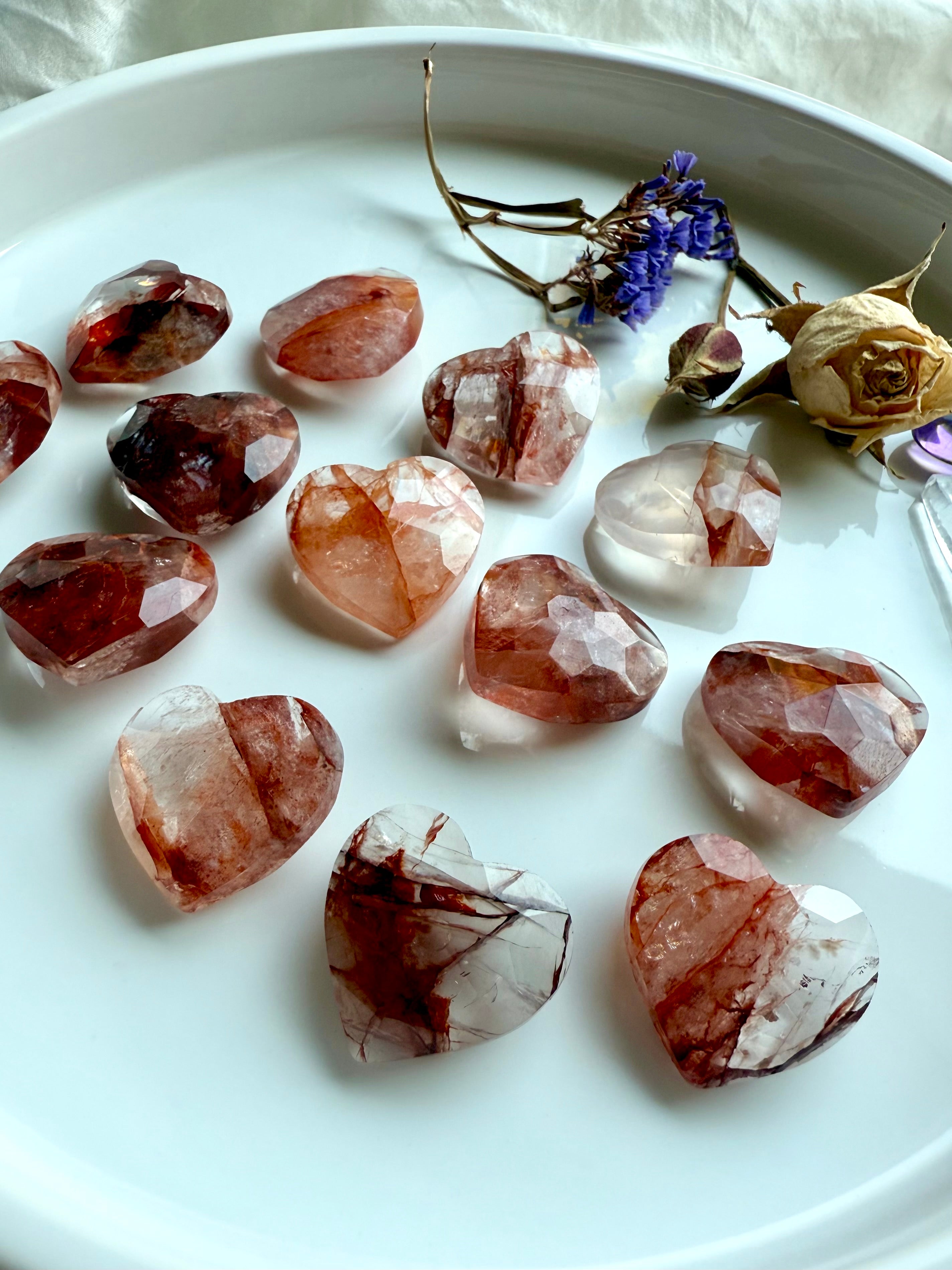 Polished Fire Quartz hearts with sparkling facets – grounding and protective healing crystal