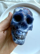 One of a kind Sodalite crystal skull with cobalt and denim blue tones and intricate white veining