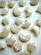 Moonstone moon and star carvings with natural shimmer and creamy ivory glow