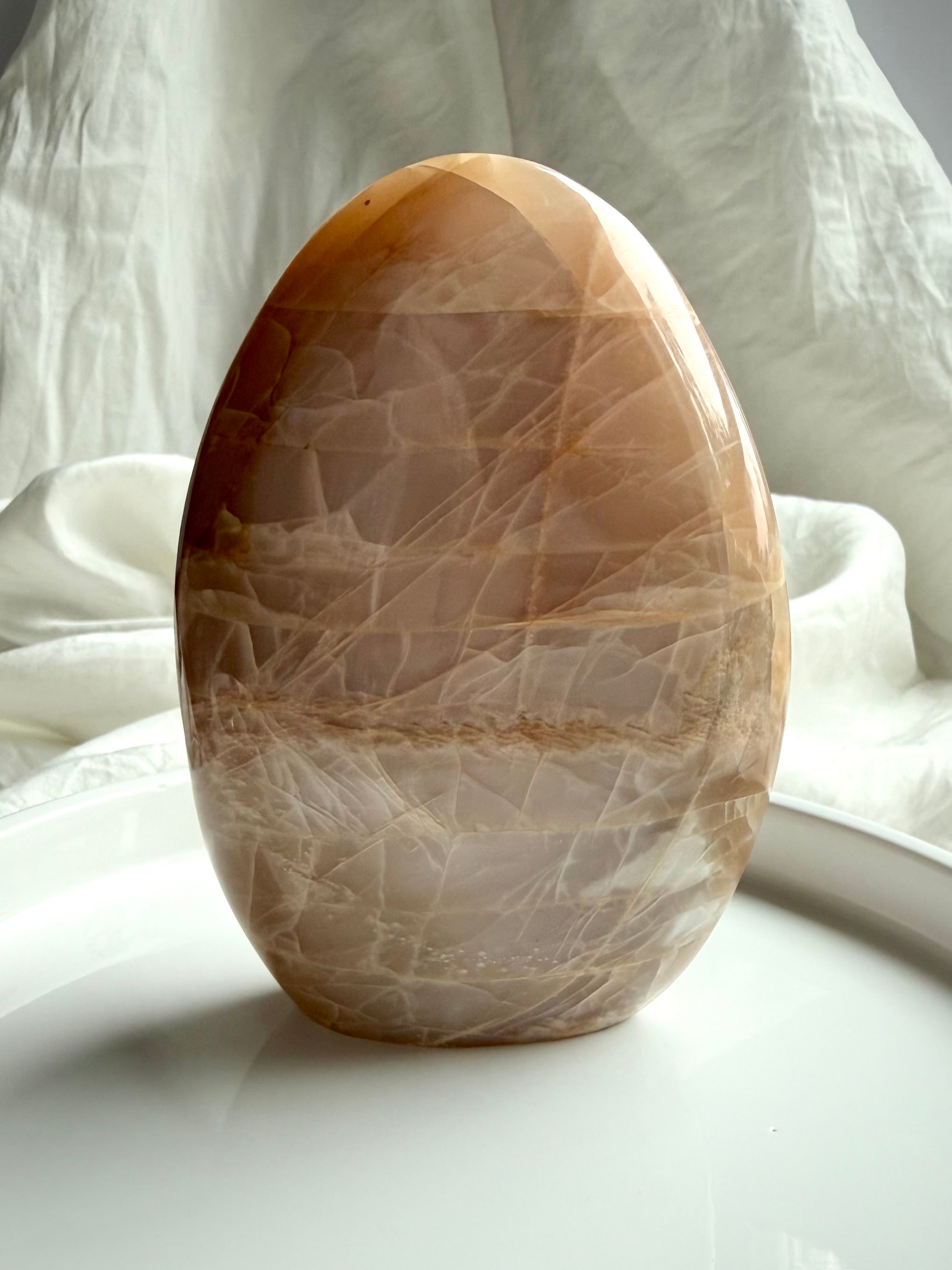 Peach Moonstone crystal freeform from Madagascar with soft glow, natural banding, and polished finish