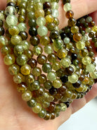 Rare green garnet bracelet stack with natural Tsavorite gemstones in golden green and olive tones