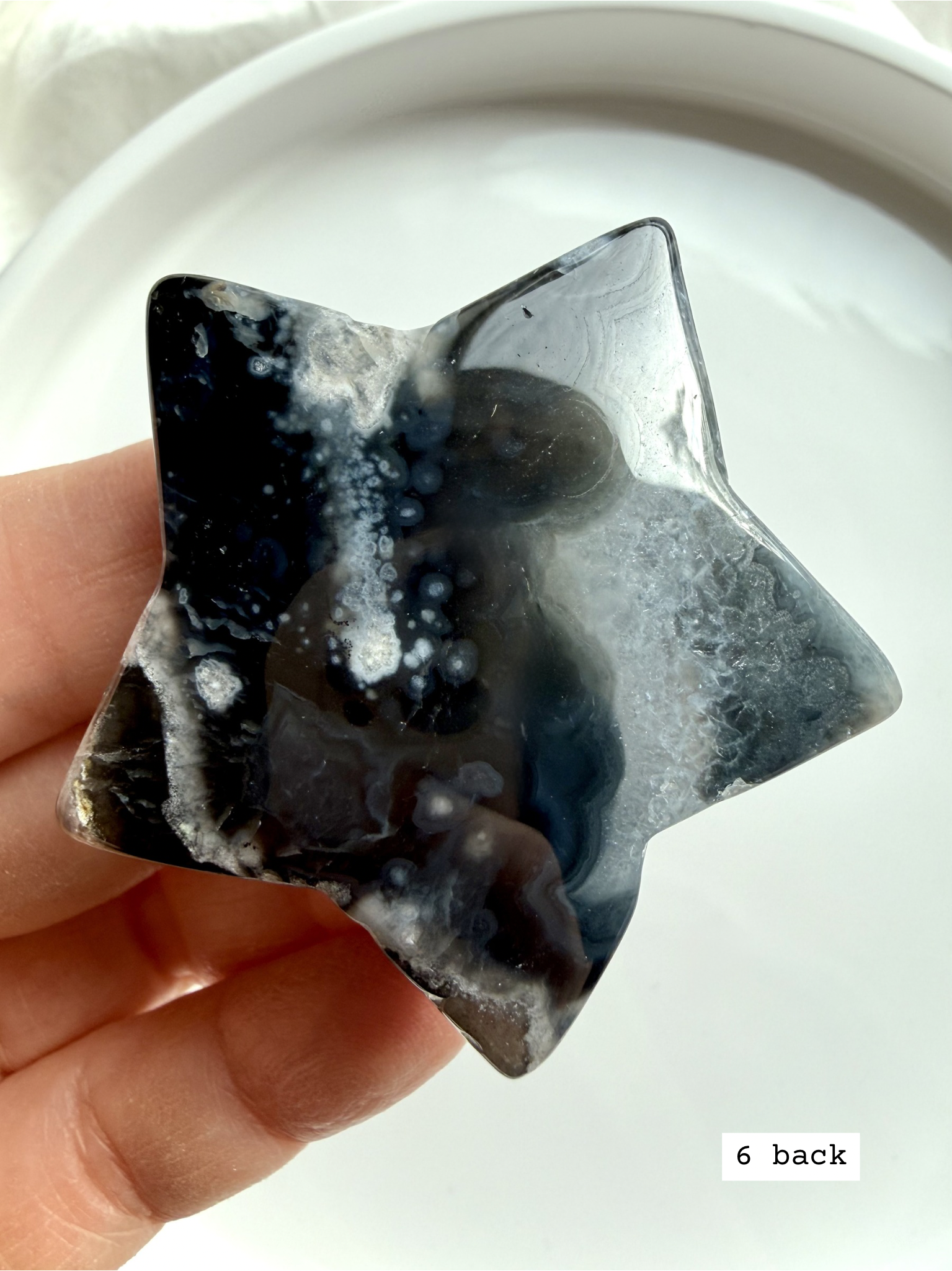 black flower agate star carving #6 back showing layered plume formations and natural stone variation