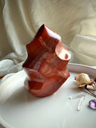 Root Chakra Red Ocean Jasper flame sculpture with bold red tones, polished finish, and transformational energy.