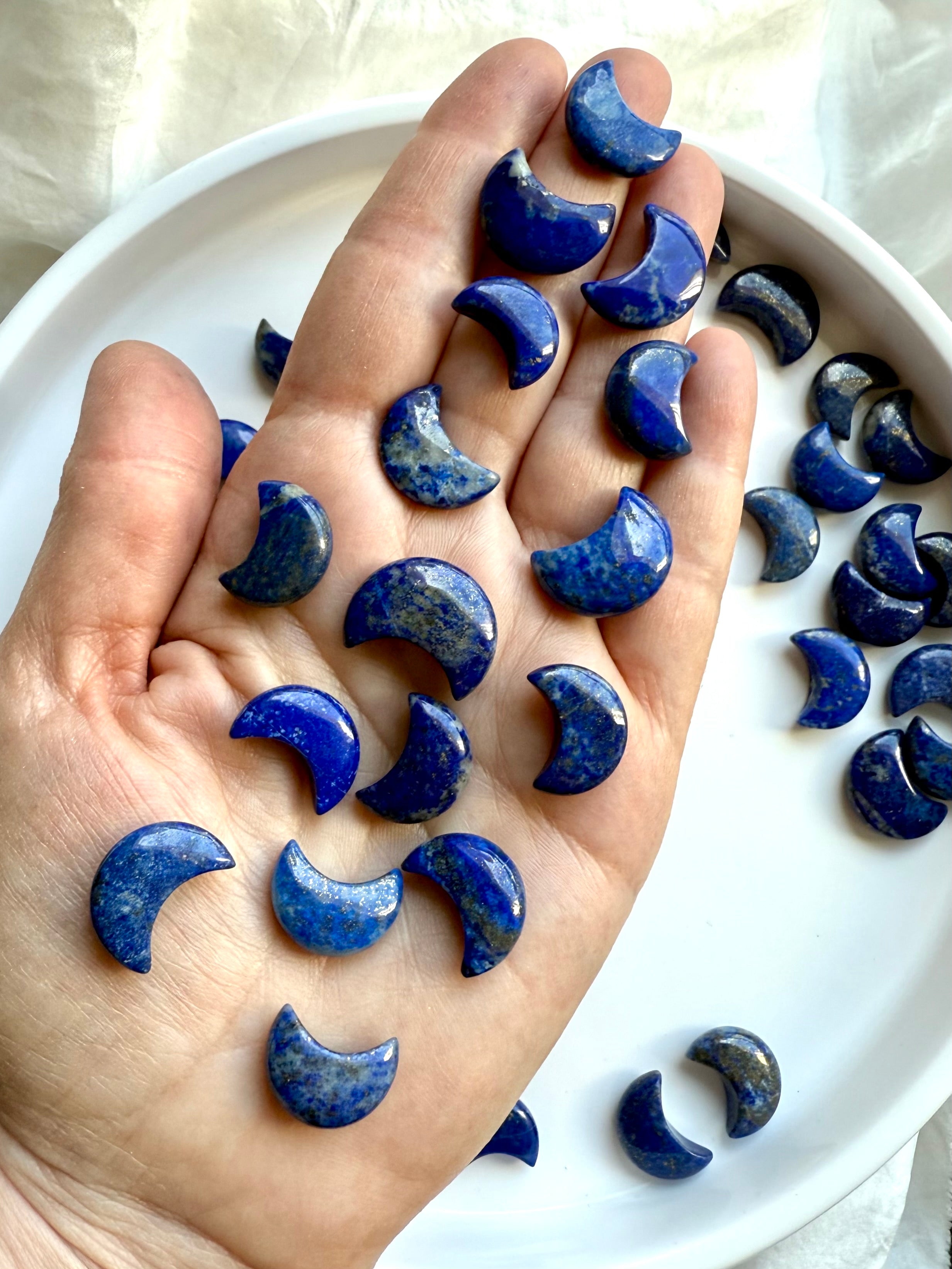 Hand-carved Lapis Lazuli moon – deep blue with golden flecks