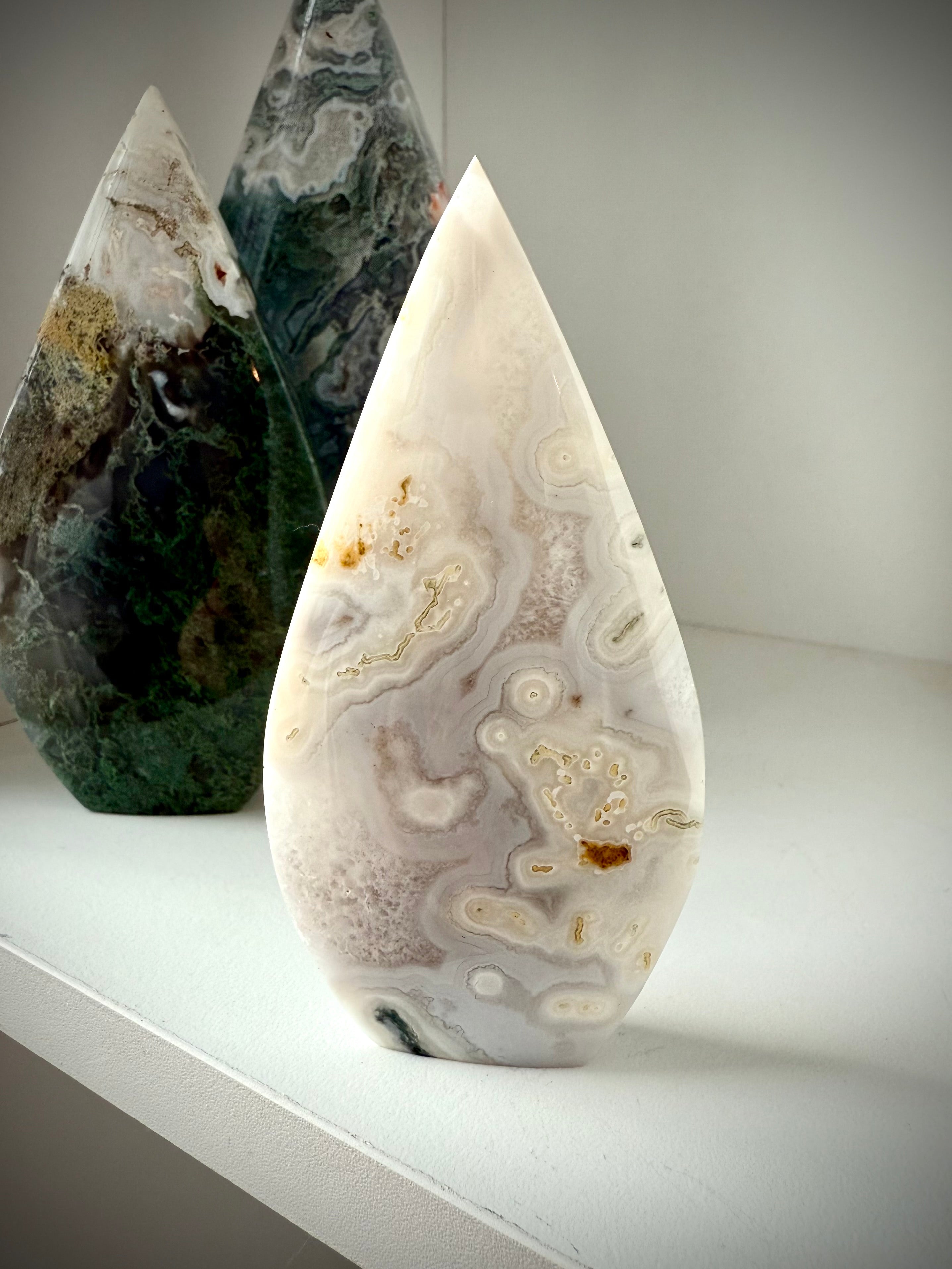 White Moss Agate flame carving with rare orbicular patterning