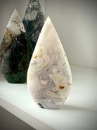 White Moss Agate flame carving with rare orbicular patterning