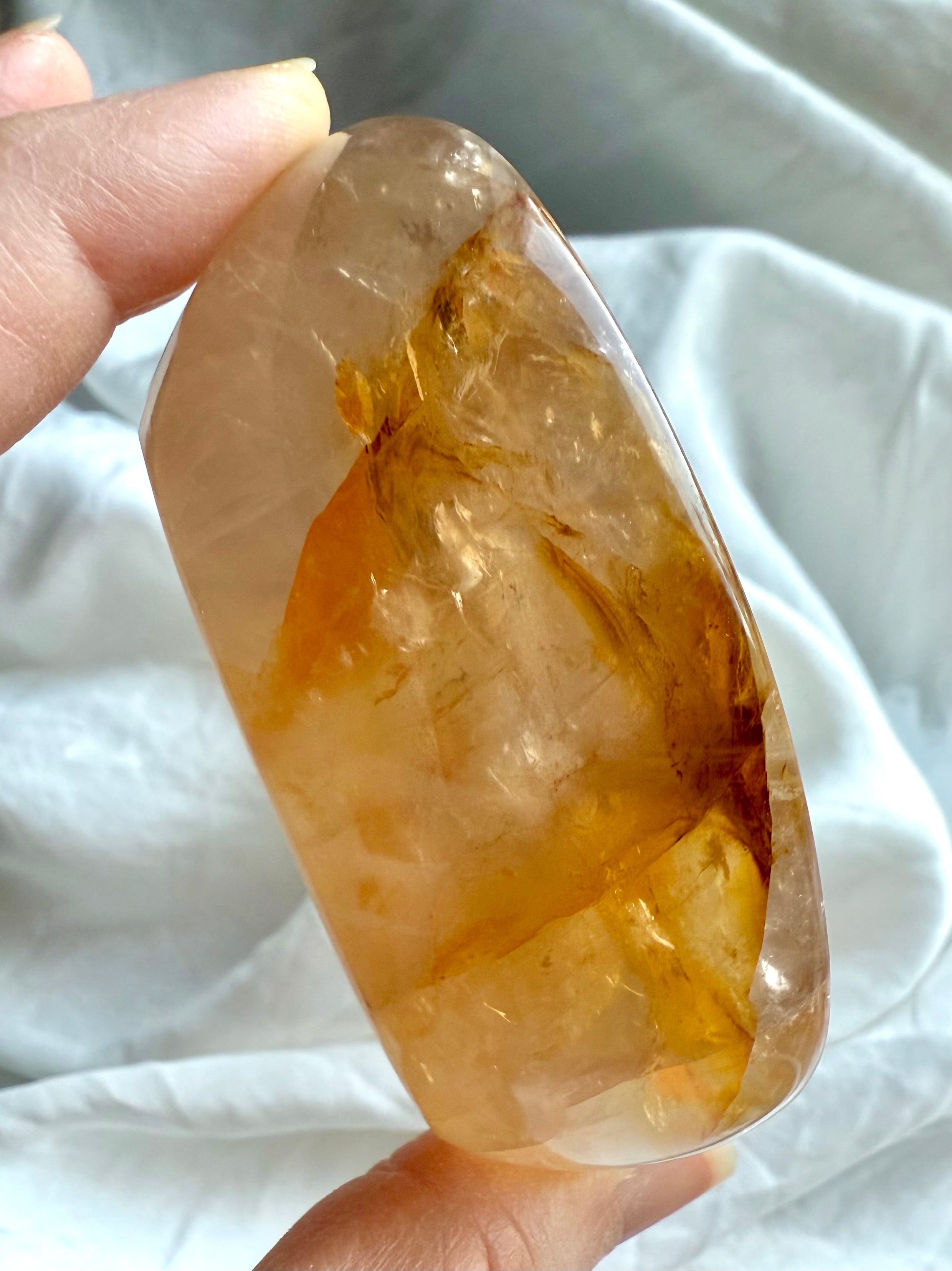 Golden Healer Quartz ring dish closeup highlighting translucent golden glow and polished finish