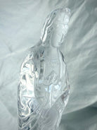Transparent crystal Quan Yin statue symbolizing compassion, peace, and divine feminine wisdom
