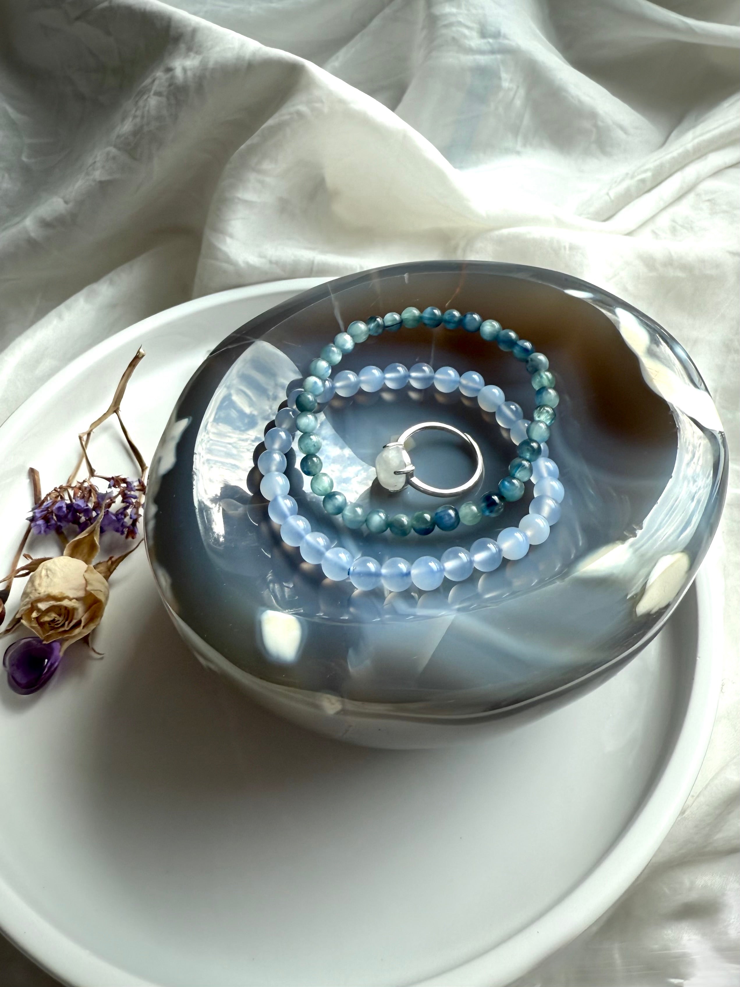 Orca Agate offering bowl with Blue Chalcedony and Kyanite bracelets, and a ring for sacred space decor
