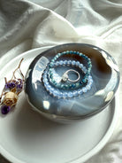 Orca Agate offering bowl with Blue Chalcedony and Kyanite bracelets, and a ring for sacred space decor