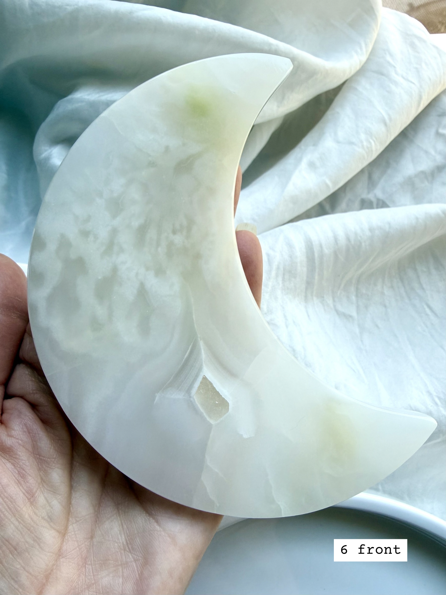 white onyx crescent moon plate # 6 front Mexican onyx crystal moon with soft white and pale green translucence
