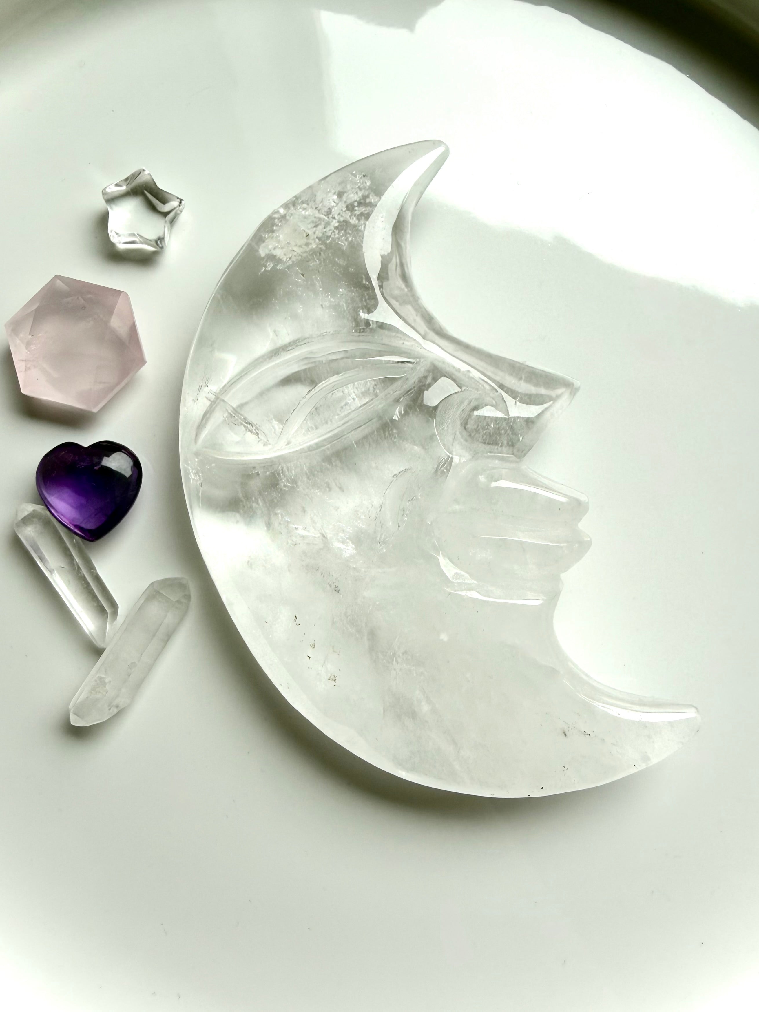 One-of-a-kind Clear Quartz Moon Face carving styled with crystals for moon rituals, meditation, and sacred space décor