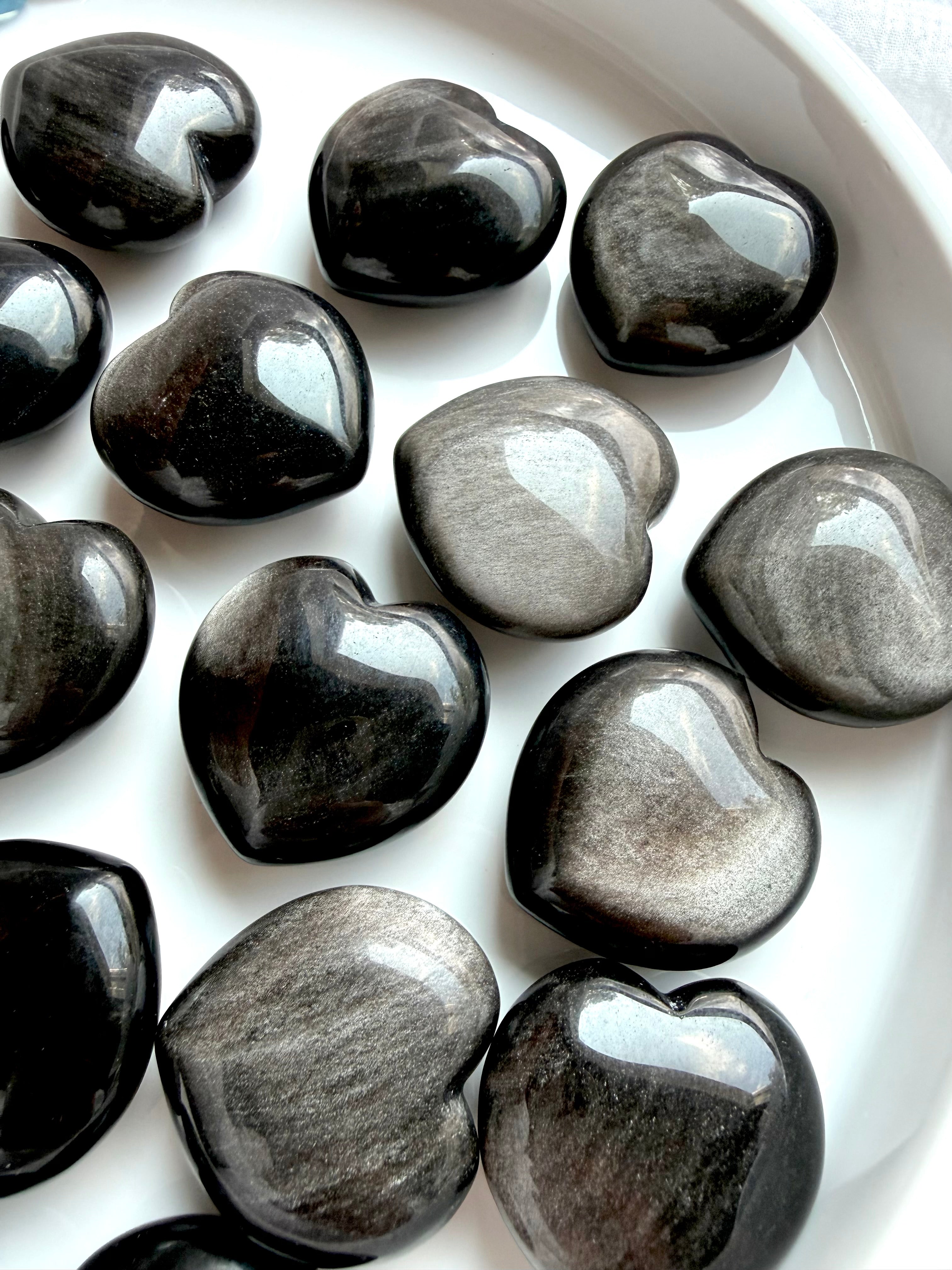 Silver Sheen Obsidian hearts with smoky gray tones and flowing silver flash for Root Chakra grounding
