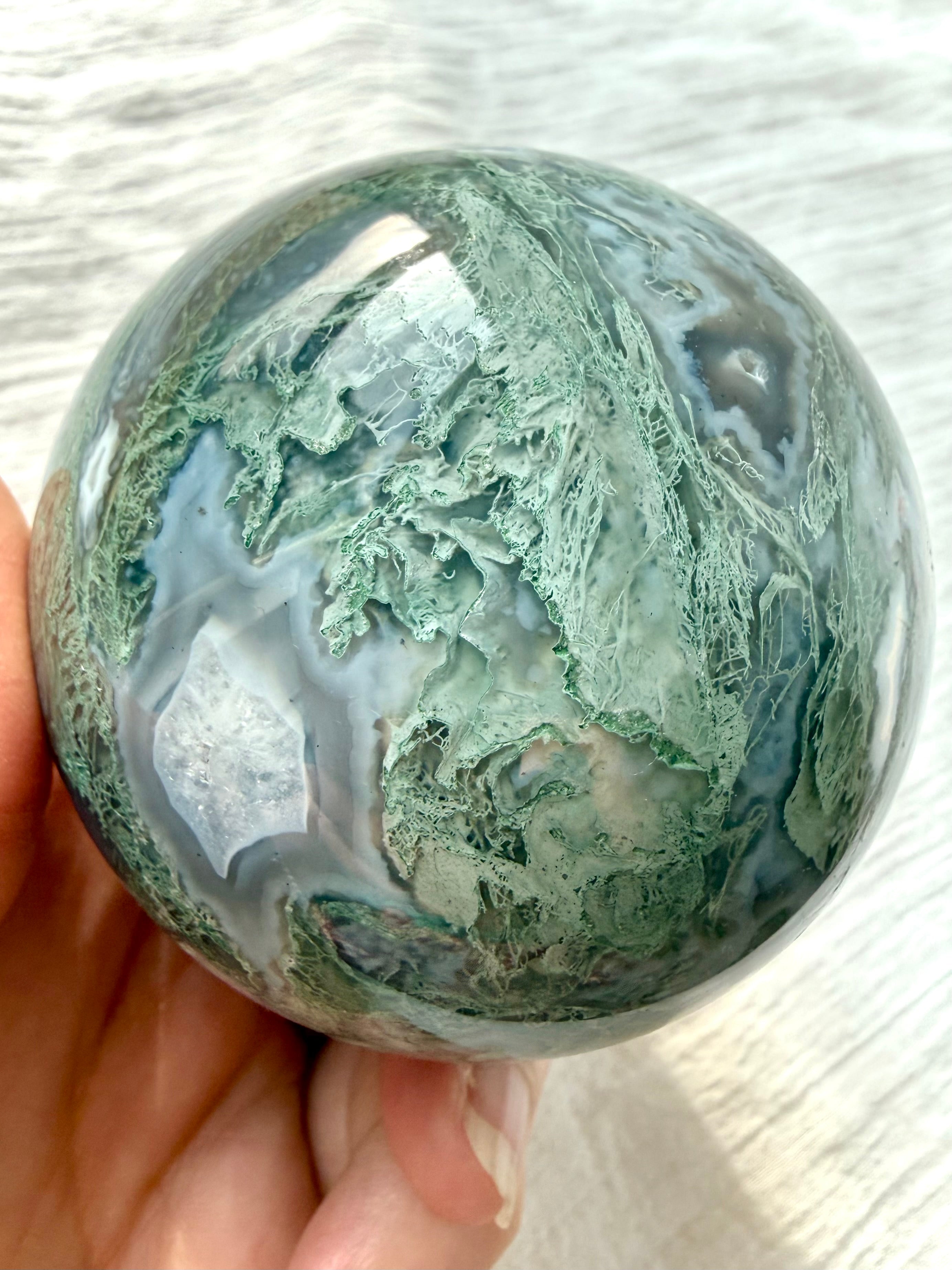 Moss Agate sphere with lacy green dendrites, gray chalcedony and sparkling Quartz