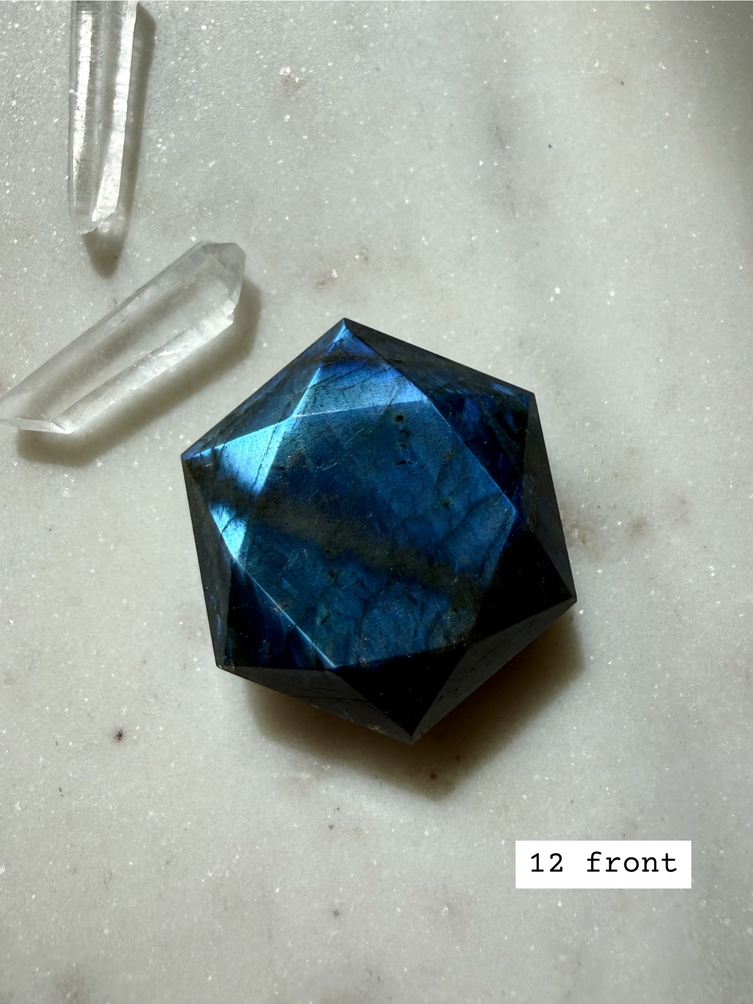 faceted labradorite hexagon crystal star of david pendant with vivid blue flash and polished geometric cut front view number 12