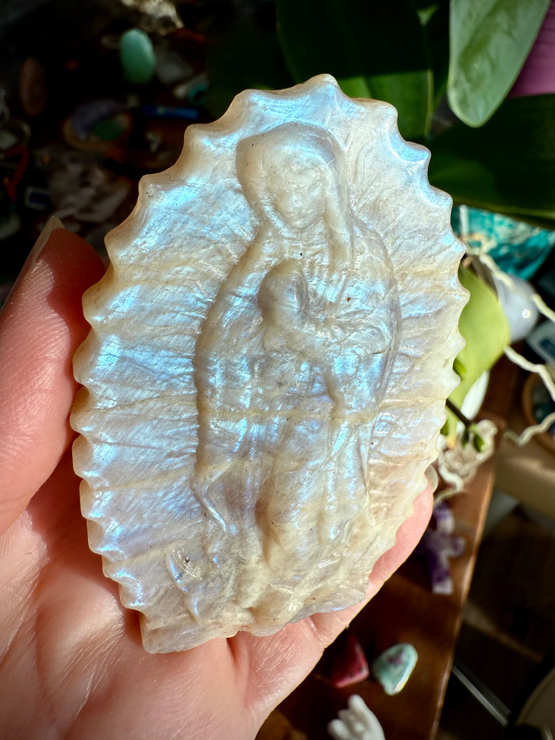 This one of a kind Moonstone Lady of Guadalupe Carving shimmers in the light