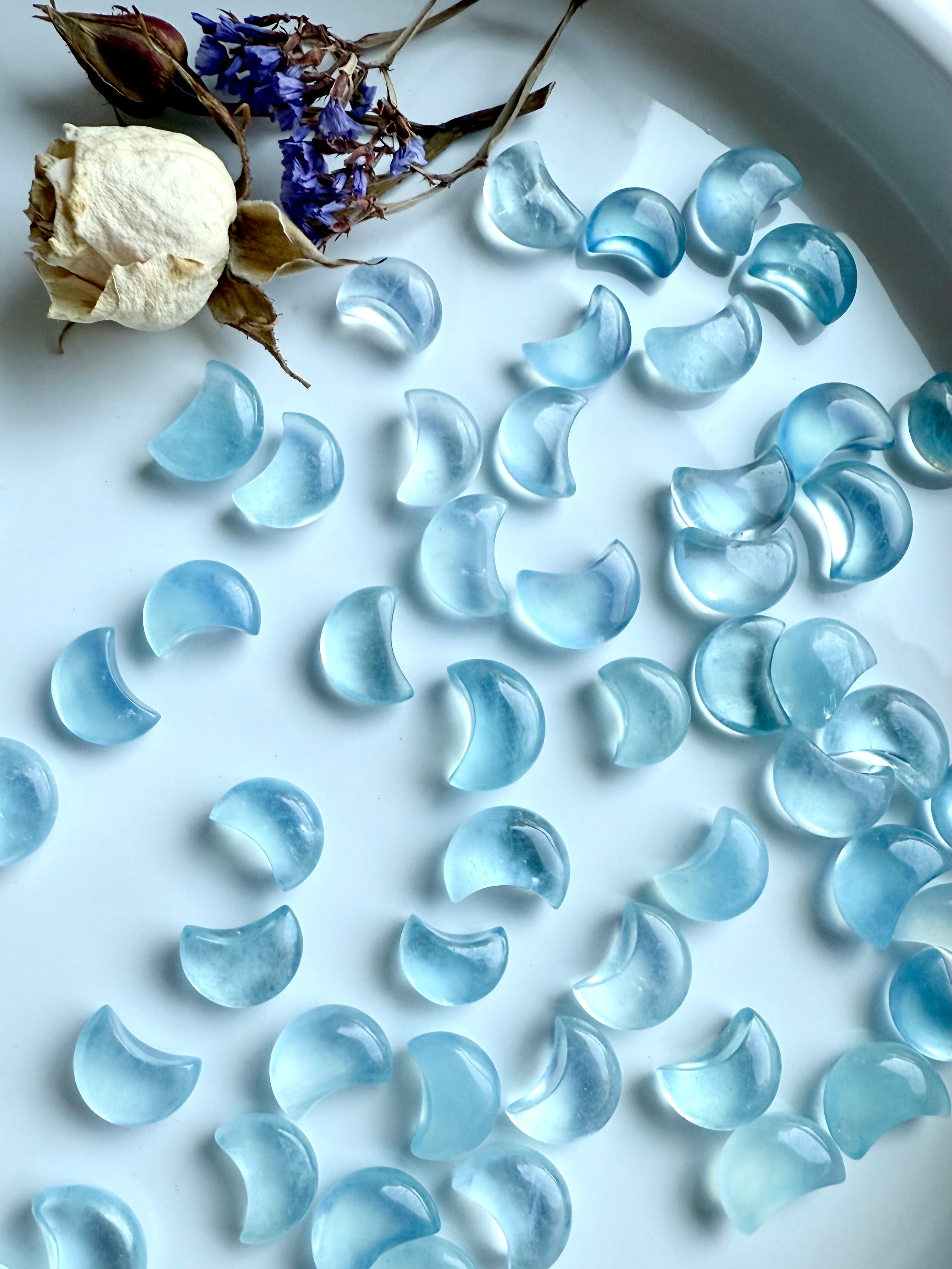 Polished Aquamarine Mini Moons showing high-clarity gemstone detail and color variation — ideal for mini altars and pocket talismans