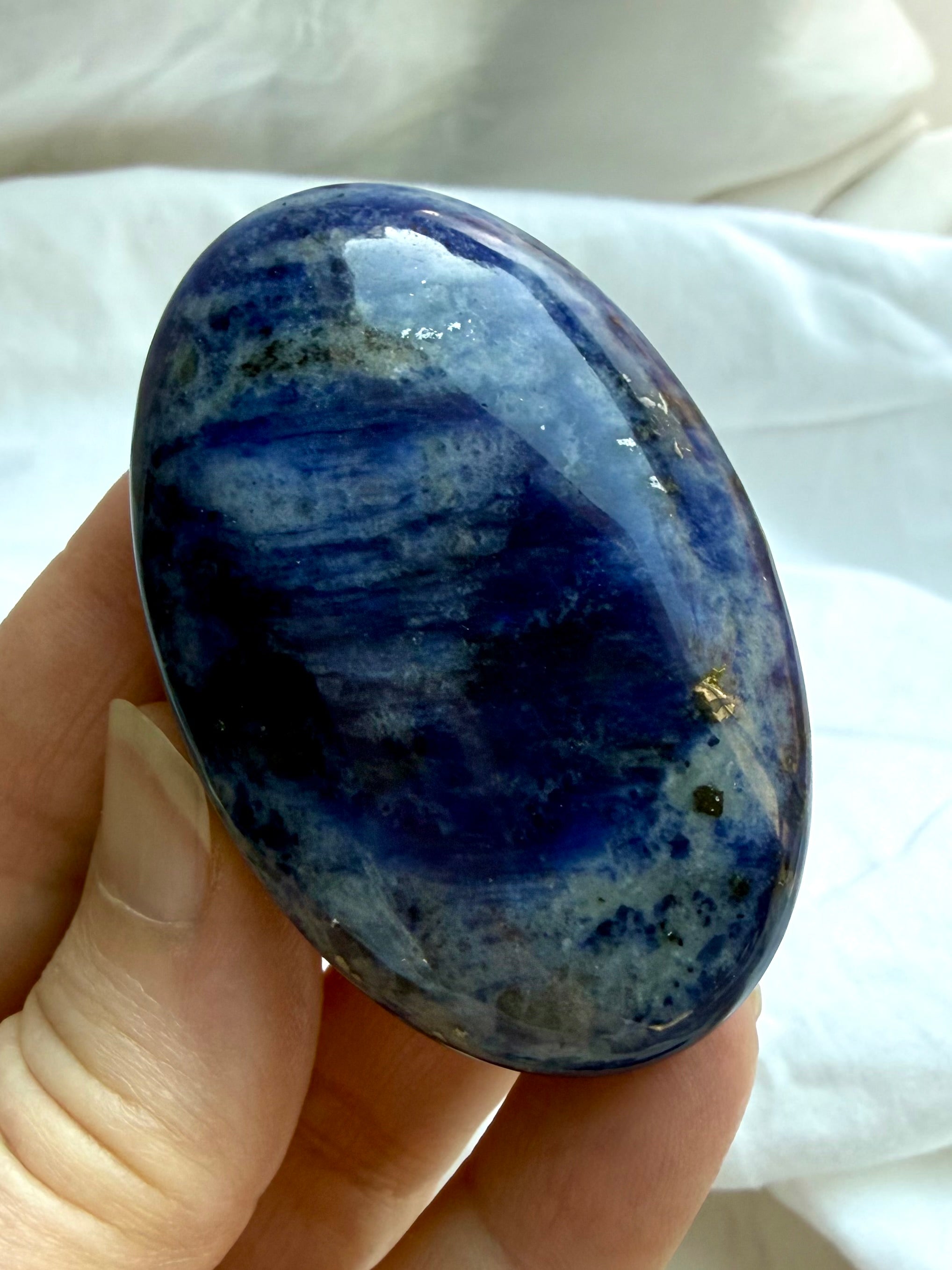 Blue Sodalite palm stone for meditation, intuition, clear communication, and Throat Chakra work