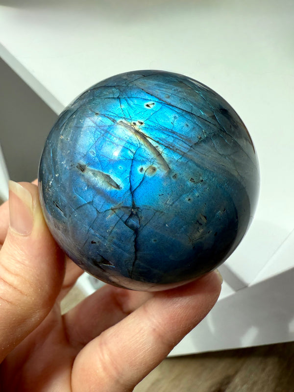 Consider this luminous Blue Labradorite Sphere to elevate your sacred space