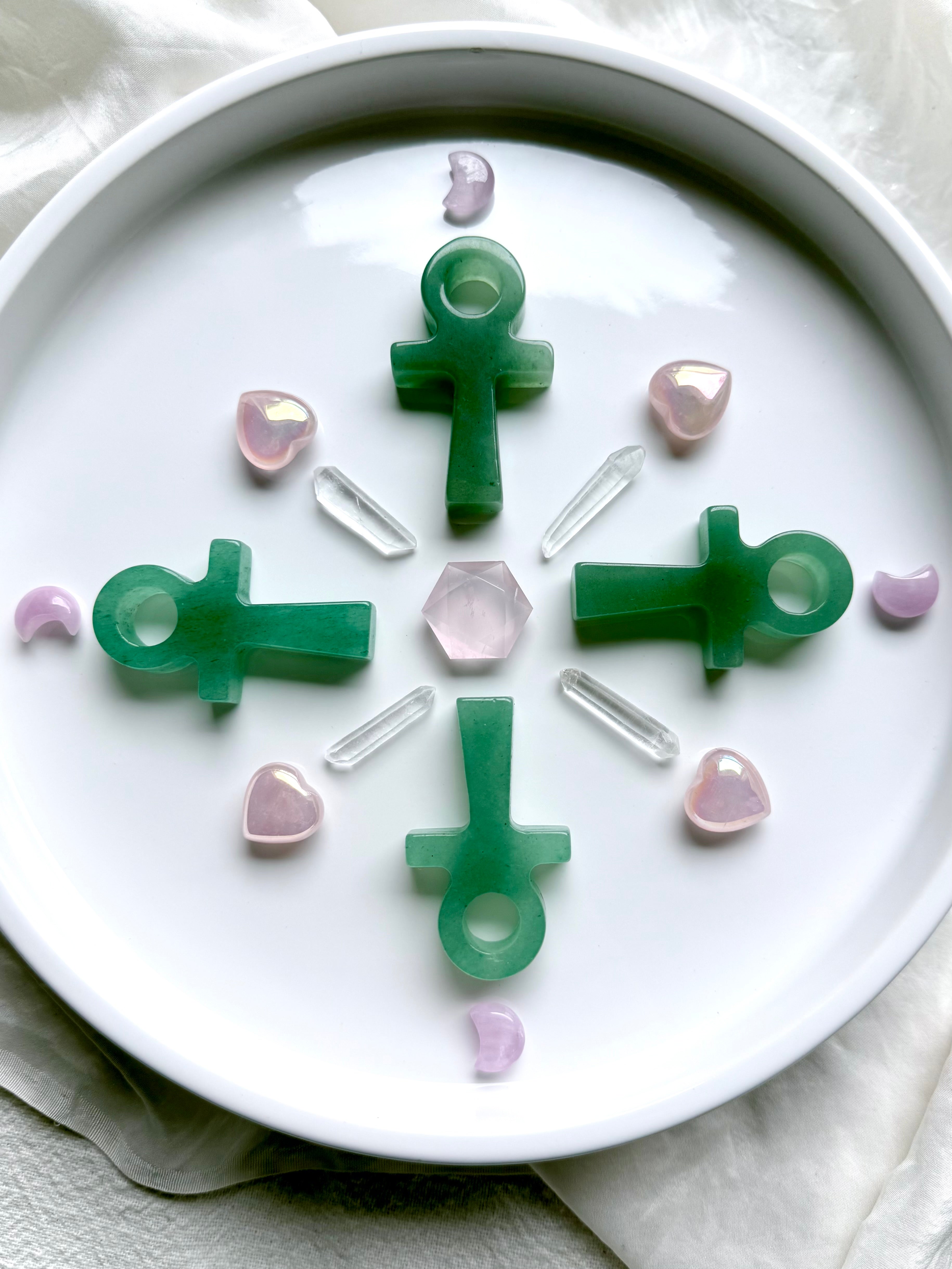 Green Aventurine crystal ankhs in sacred geometric layout with rose quartz hearts and clear quartz – ankh symbol for meditation, rebirth, and heart chakra energy