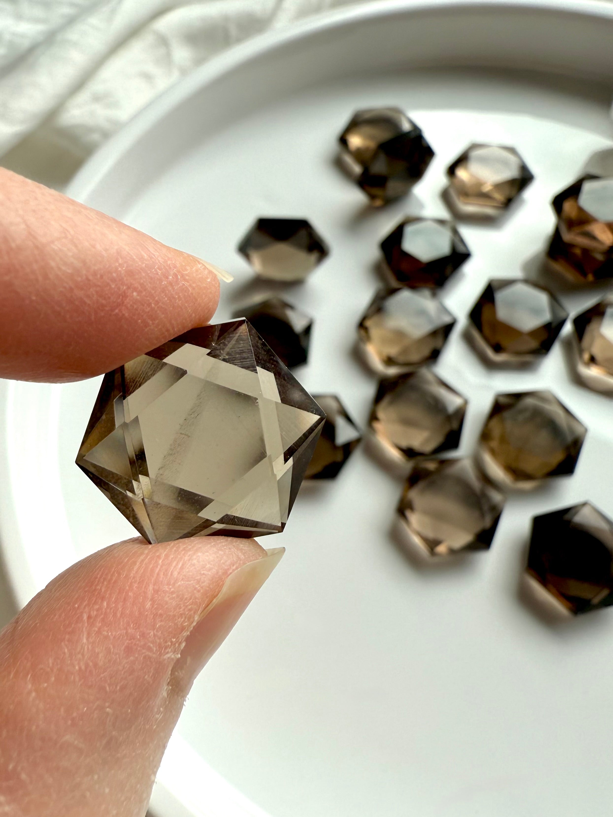 Faceted Smoky Quartz hexagon crystal with deep smoky brown color and precision-cut edges