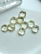 Citrine hexagons arranged in a sacred geometry crystal grid for abundance, manifestation, and intention setting
