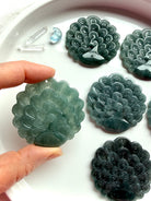 Blue Water Jade peacock medallions with detailed double-sided carvings in natural Guatemalan jade